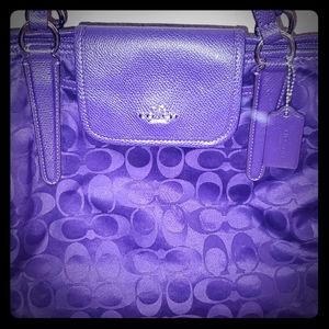 Beautiful purple coach purse.